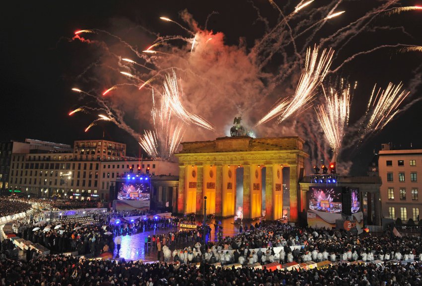 Fireworks are seen at the Brandenburg Gate in Berlin, Germany, Monday, Nov. 9, 2009, during the commemorations of the 20th anniversary of the fall of the Berlin Wall on Nov.9, 1989. (AP Photo/Gero Breloer)